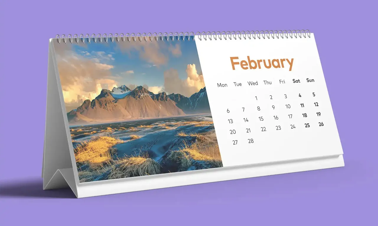 Custom wedding invitation cards and branded wall calendars with foil finishing